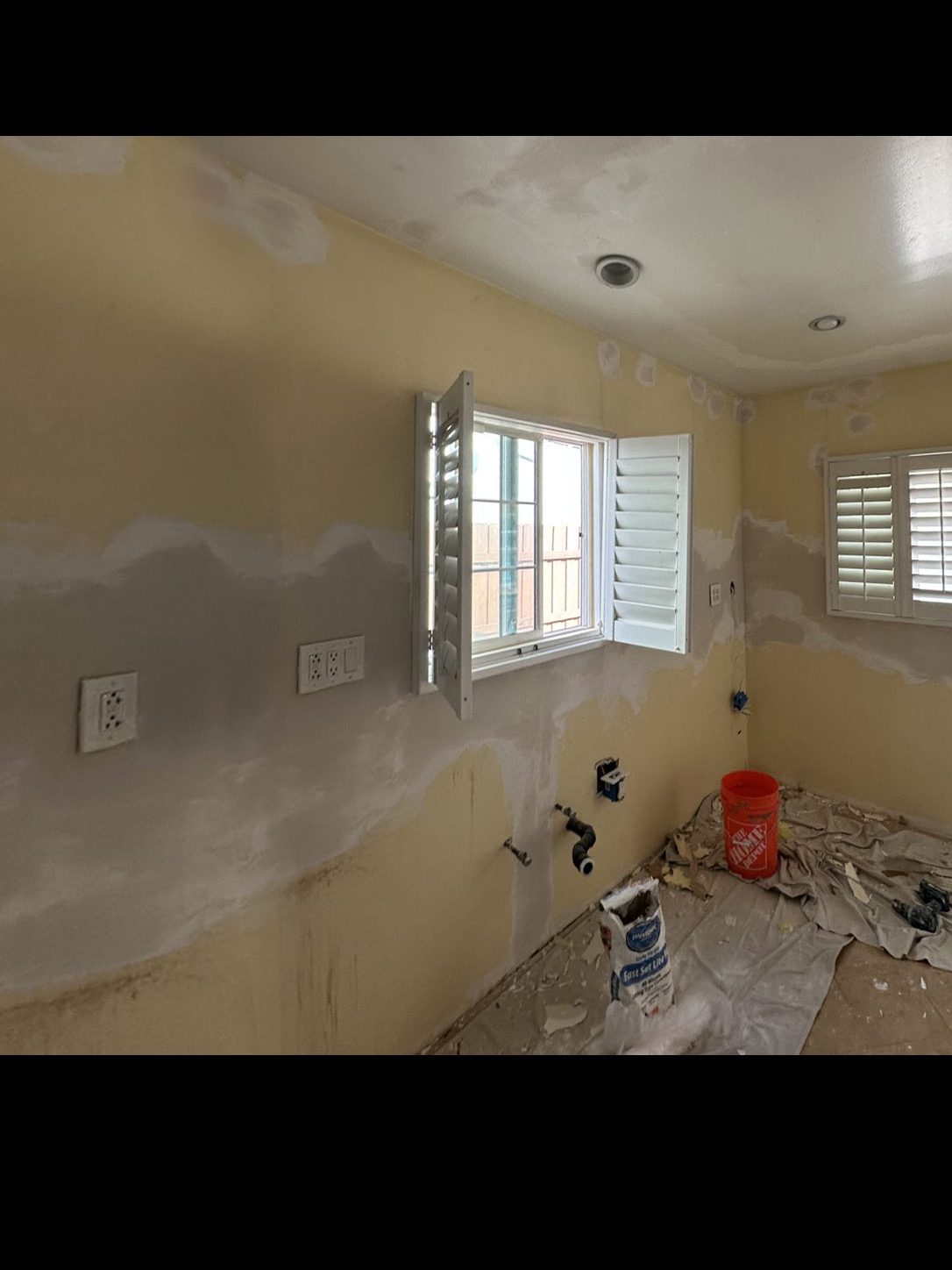 Kitchen before remodel, drywall and framing stage